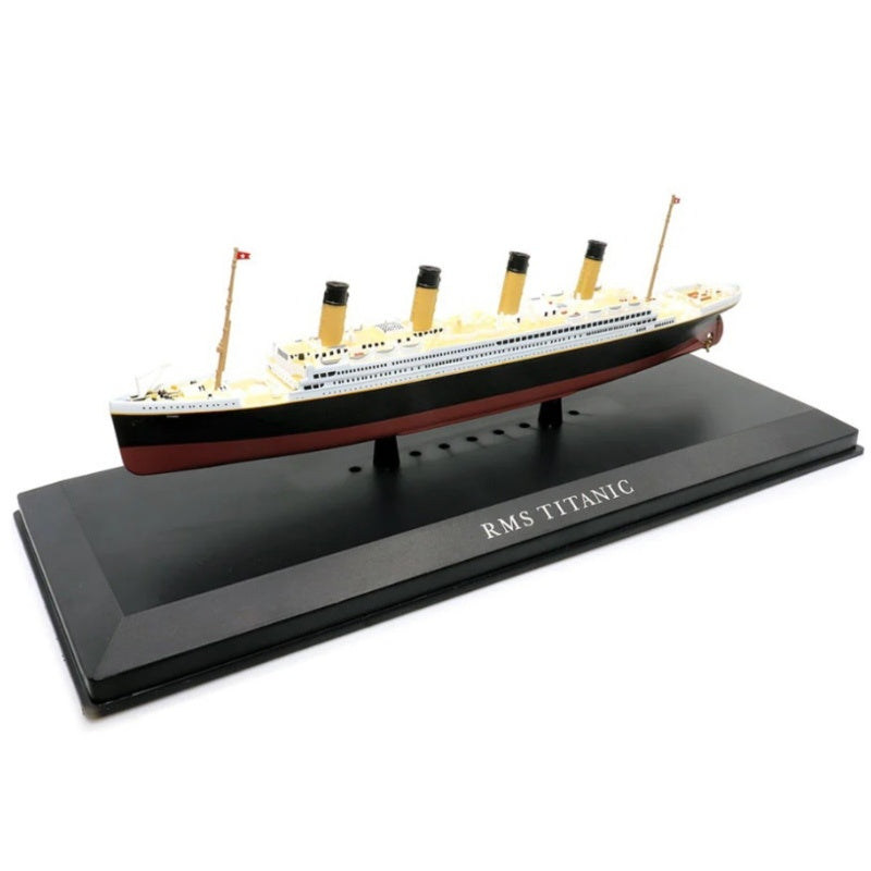 The Titanic 1/1250th scale diecast model sitting atop a black rectangular base, subtly printed with the words RMS Titanic.