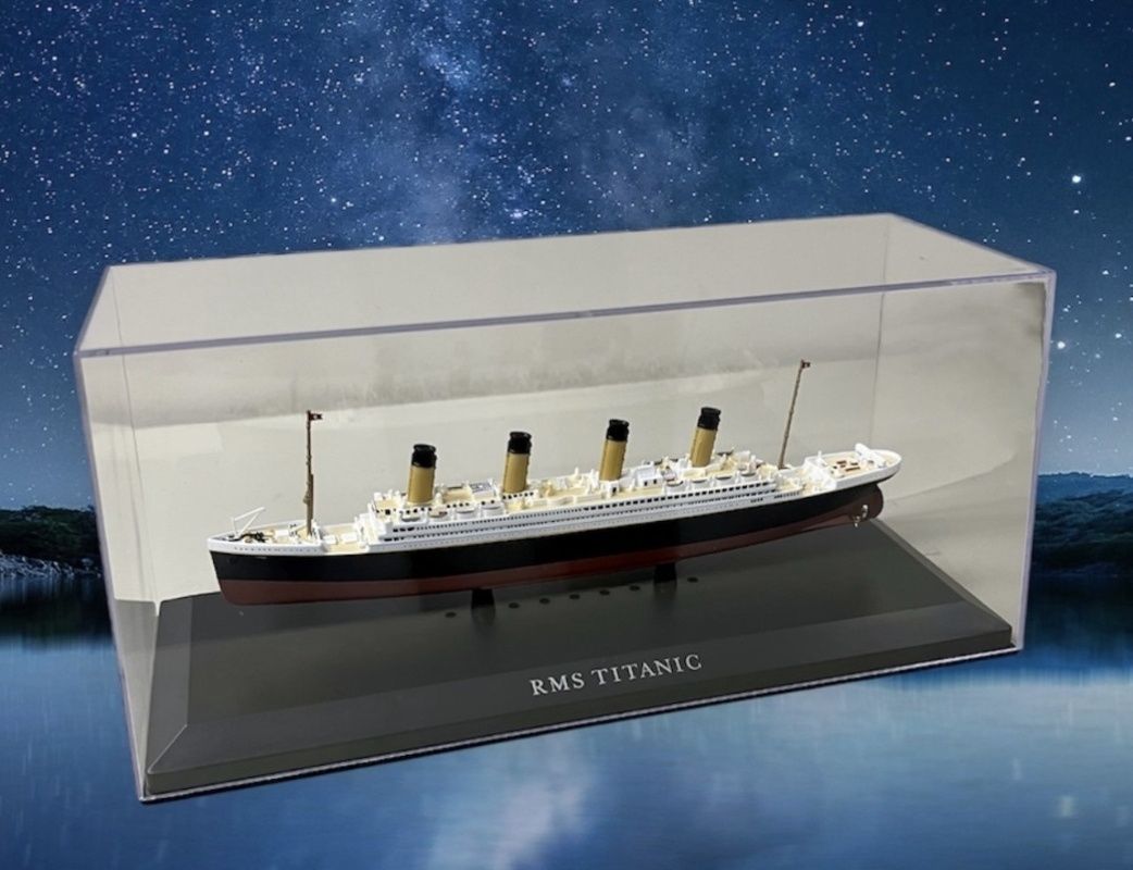 A top angle view of the diecast model of Titanic in its acrylic dust cover.