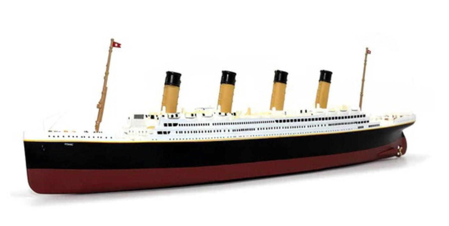 Just the diecast Titanic model sitting without any base, the ship's name is printed in tiny white letters near the bow, the details are close to the real ship's proportions.