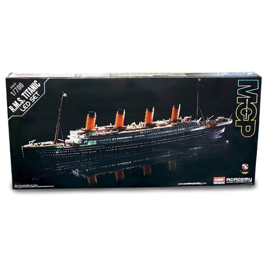 Black box for Titanic model with dozens of tiny spots of light in the ship's windows.