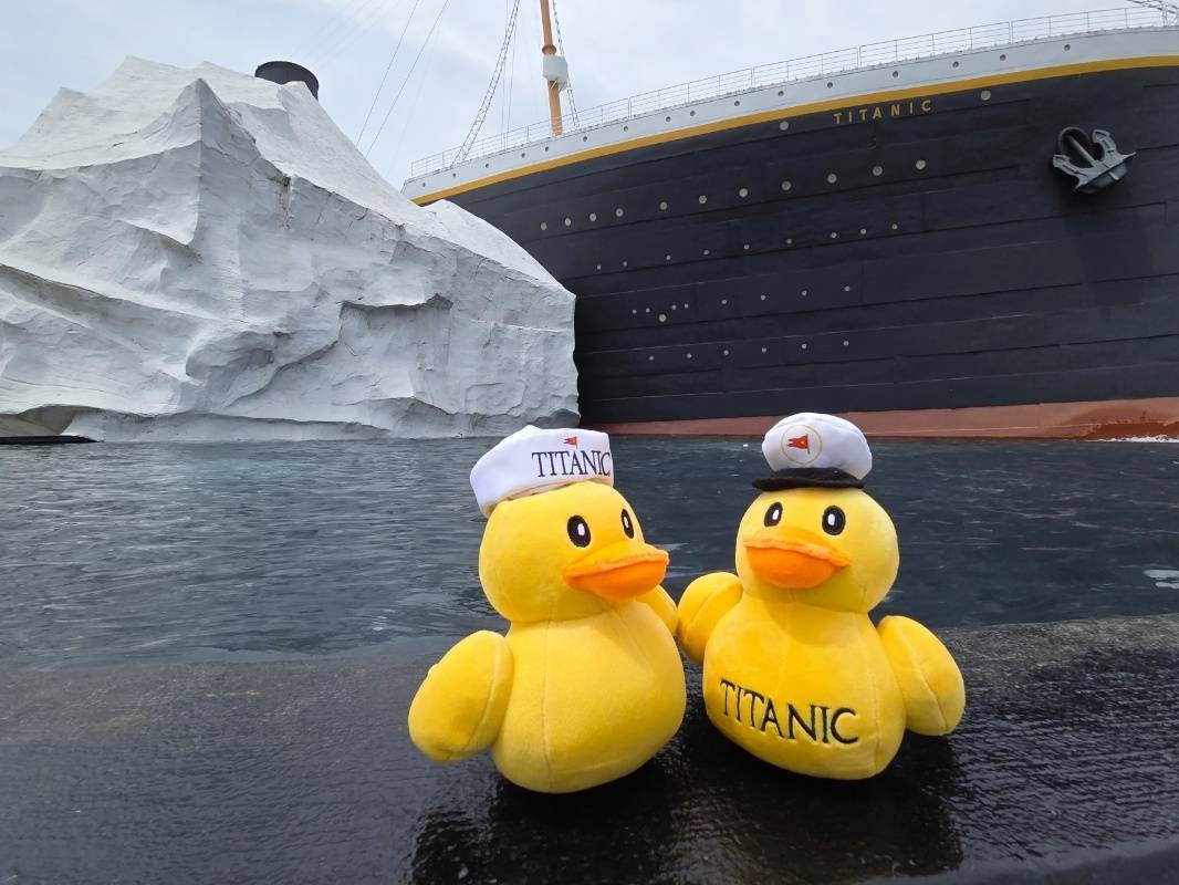 Two plush ducks in front of the Titanic Museum Attraction.