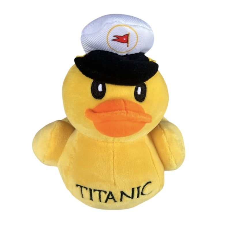 Yellow plush duck wearing a captain hat.