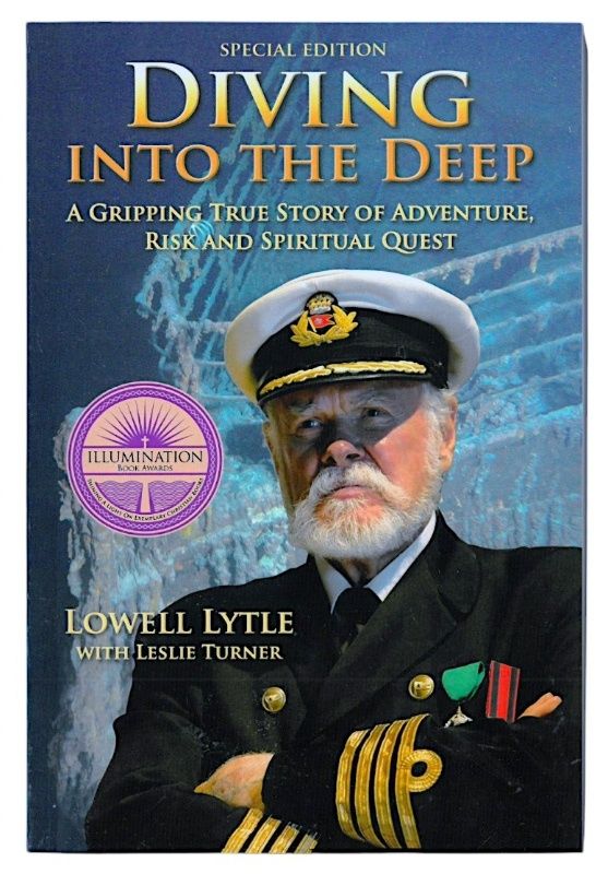 Front cover of Diving into the Deep shows the author dressed as Captain Smith in front of the bow of Titanic's wreckage.