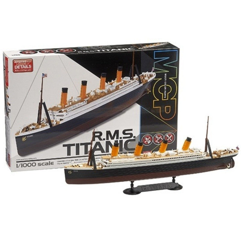 Small and detailed Titanic model with color sitting on its base.