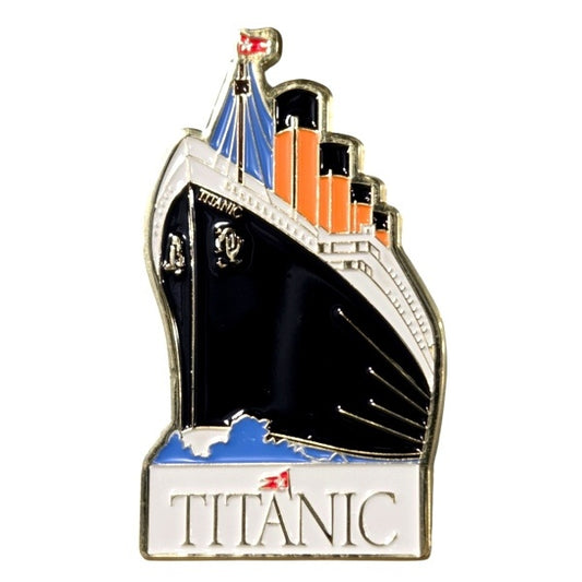 A colorful enamel-filled metal magnet showing a dynamic image of Titanic from its bow. The metal has a shiny gold-tone finish, and the outline is shaped to fit the image. Titanic's name is boldly written in gold metal on a white  enamel background on the bottom.