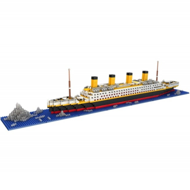 Completed block kit model of Titanic on blue base with clear iceberg.