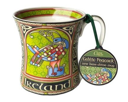 The same flared mug decorated with Celtic knots, a peacock, and the word Ireland, this time depicted with its tag stating it is crafted with bone china.