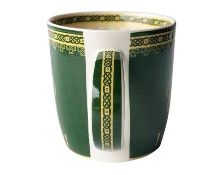 The handle is printed with green along the outer edge and a yellow stripe down the middle decorated with green Celtic knots.