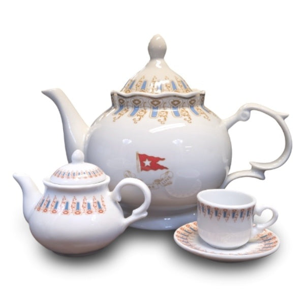 Miniature Wisteria Teacup and Teapot next to a full sized Wisteria Teapot for scale. The mini teapot is almost half as tall as the normal version.