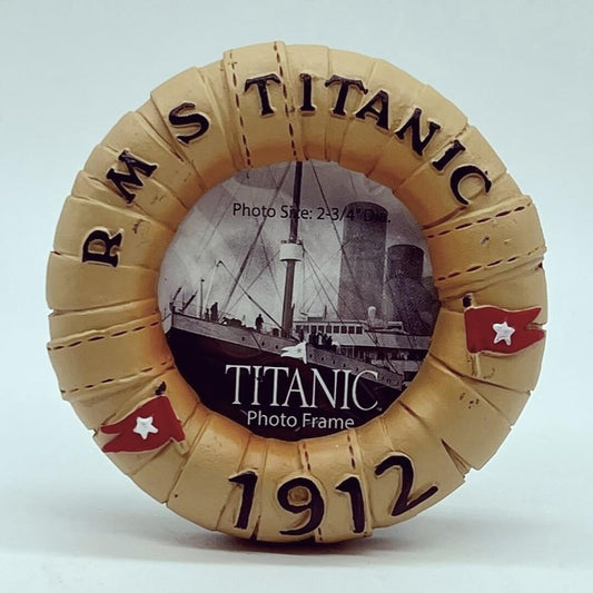 A miniature photo frame in a circle life-ring shape. The life ring is a vintage light brown and decorated with two red White Star Line flags. It says RMS Titanic 1912.