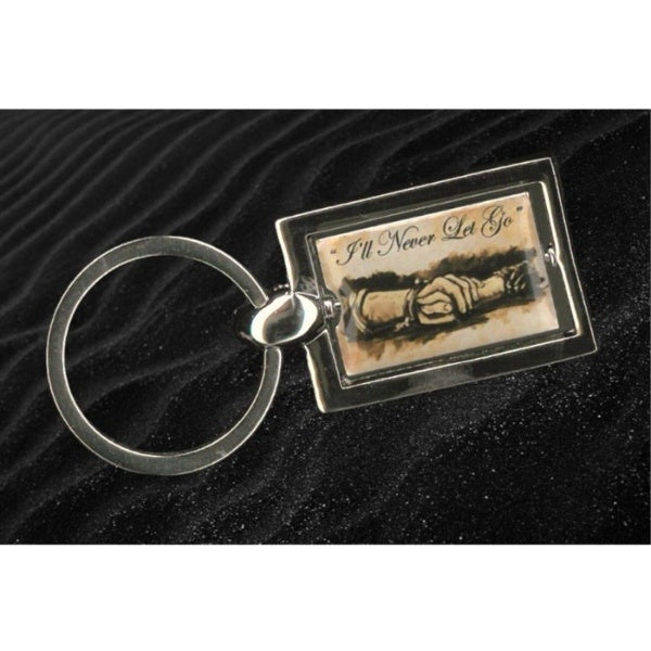 A small rectangular key ring that spins inside a silver tone frame. The design shows two hands clasped and the quote "I'll never let go".
