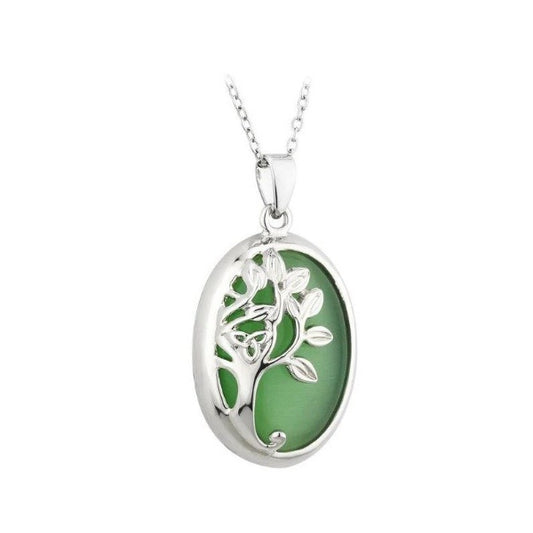 A green oval cat's eye stone that reflects the light in interesting lines is encircled by silver-tone Rhodium, decorated with a tree and trinity knot design.