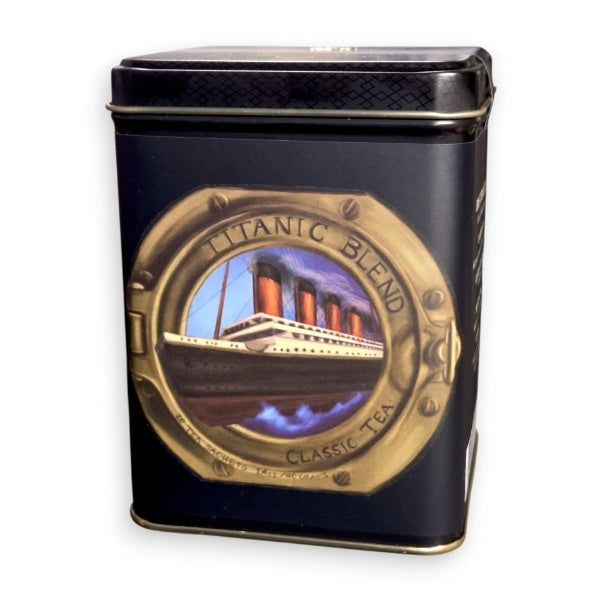 A black square tin with a chalk pastel illustration of Titanic sailing through a golden porthole. It says Titanic Blend Classic Tea.