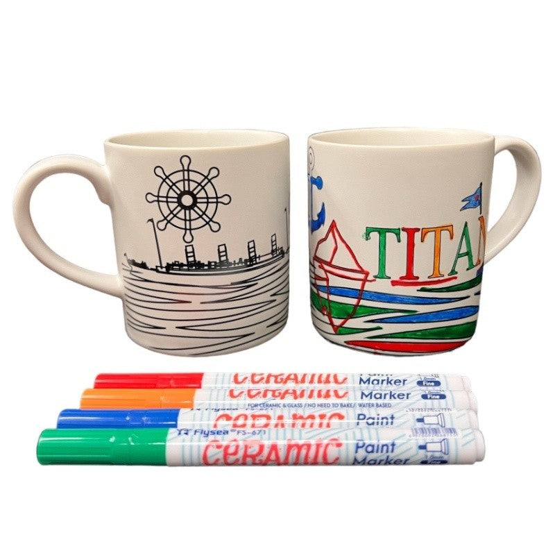 An example showing one new and one colored mug with a Titanic theme and ceramic paint markers. 