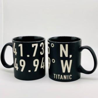 Black Titanic mug with bold white text engraving.