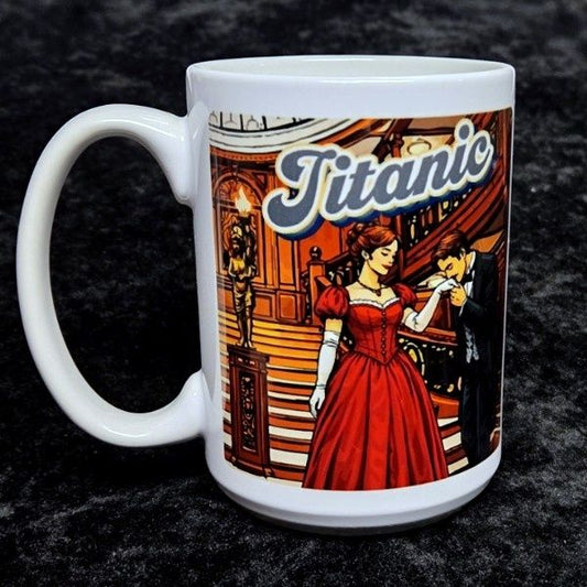 A fancy gentleman kisses a lady's glove on the grand staircase under the word "Titanic" printed in grey. White mug printed with colorful image.