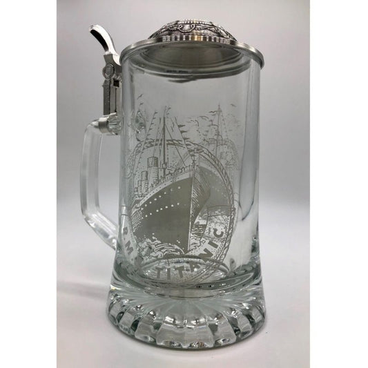 Clear glass stein with white image of Titanic printed on two sides.
