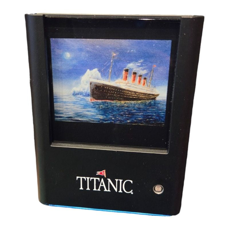 Titanic nightlight turned off. Illustration of ship and iceberg is clearly seen.