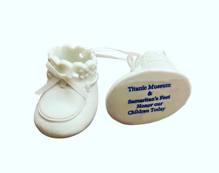 Bottom of ornament showing text "Titanic Museum & Samaritan's Feet Honor our Children Today".
