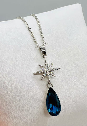 NORTH STAR PENDANT WITH BLUE TEARDROP